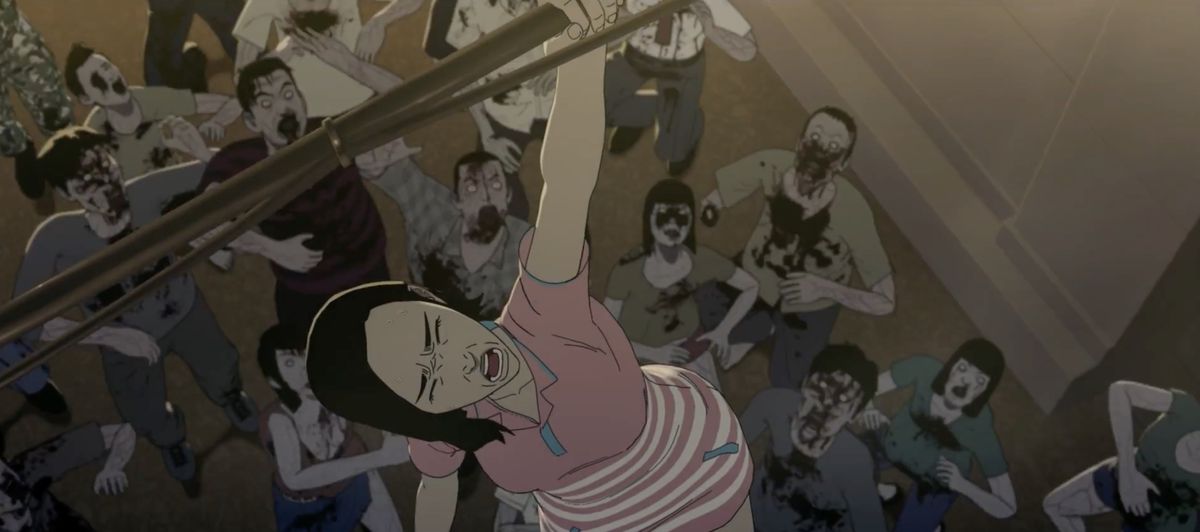 Seoul Station: A woman hangs on a bar over a horde of zombies