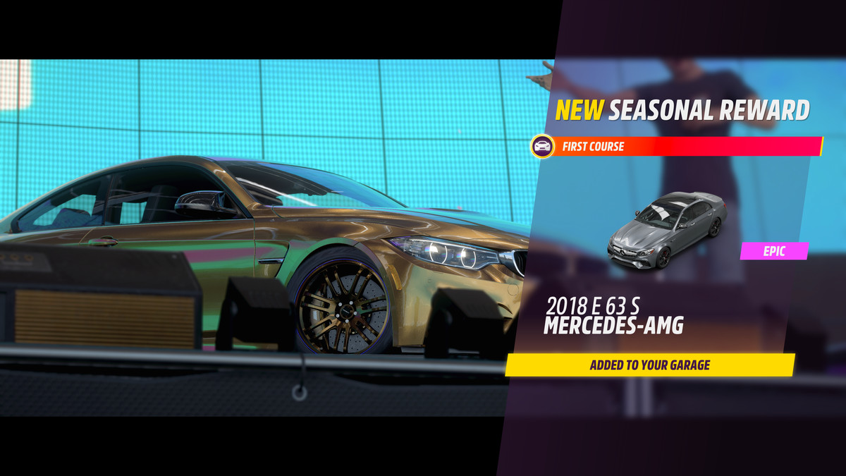 Winning screen showing a gold car in the background and a 2018 Mercedes-AMG as the first place prize.