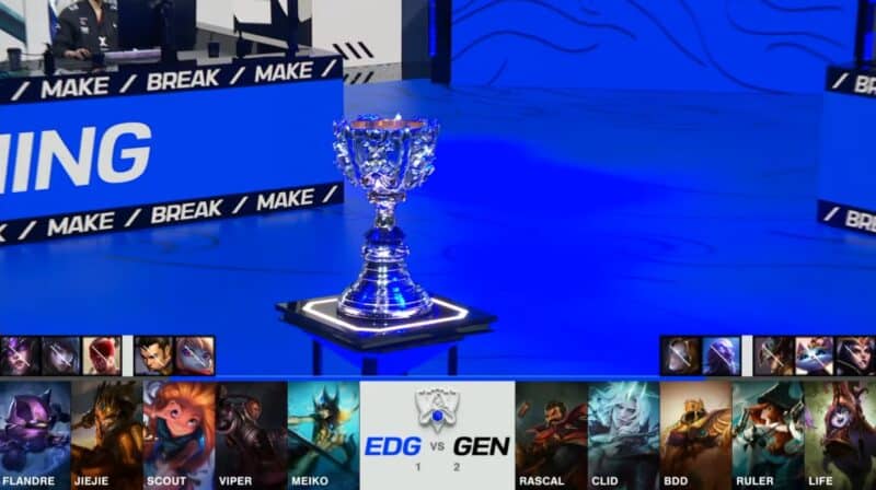 A screenshot from the 2021 World Championship Main Event Semifinals broadcast, showing the Game Four champion drafts between Edward Gaming and Gen.G with a shot of the Summoner's Cup on stage above.