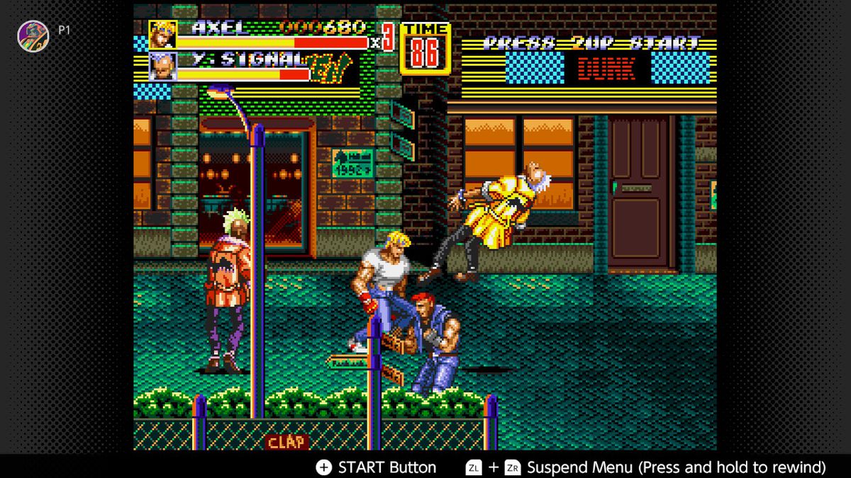 Players brawl through the street in Streets of Rage 2