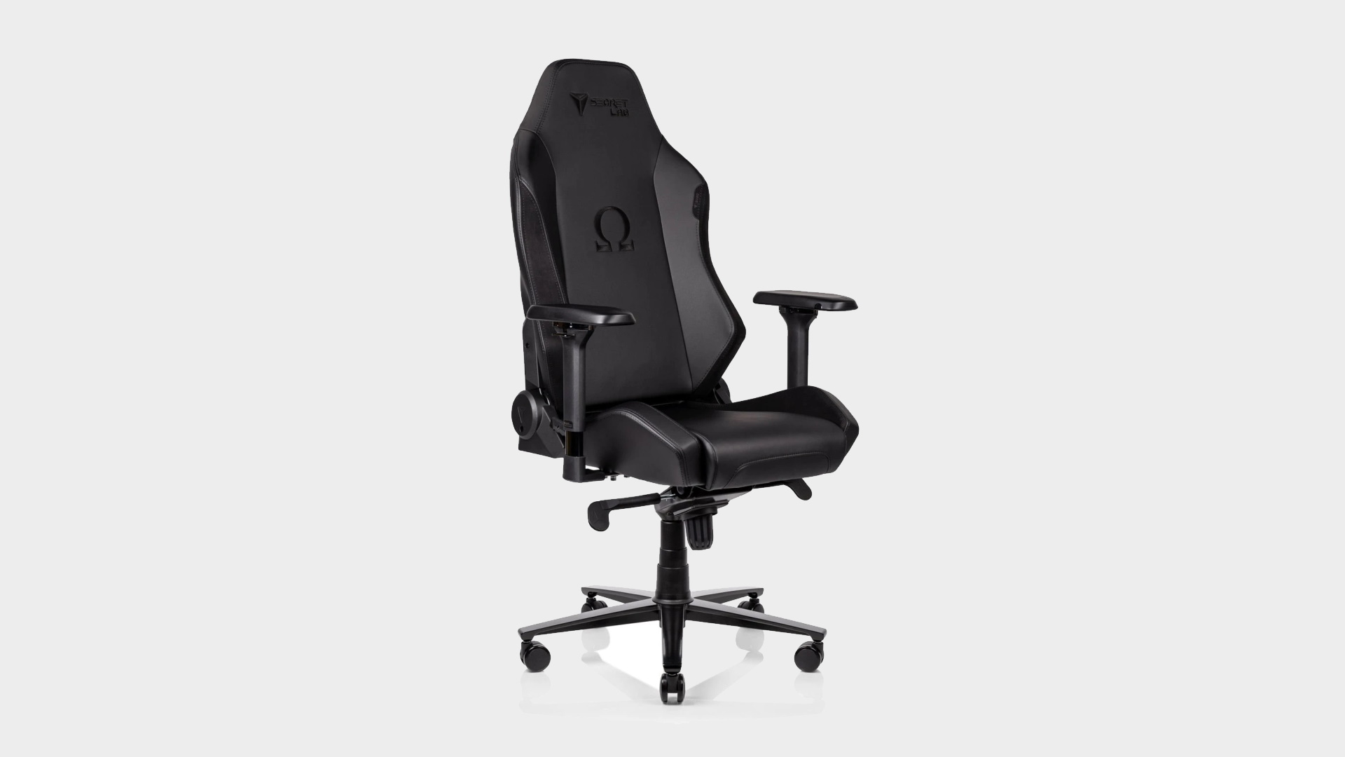 Secretlab OMEGA 2020 Series gaming chair on a grey background.
