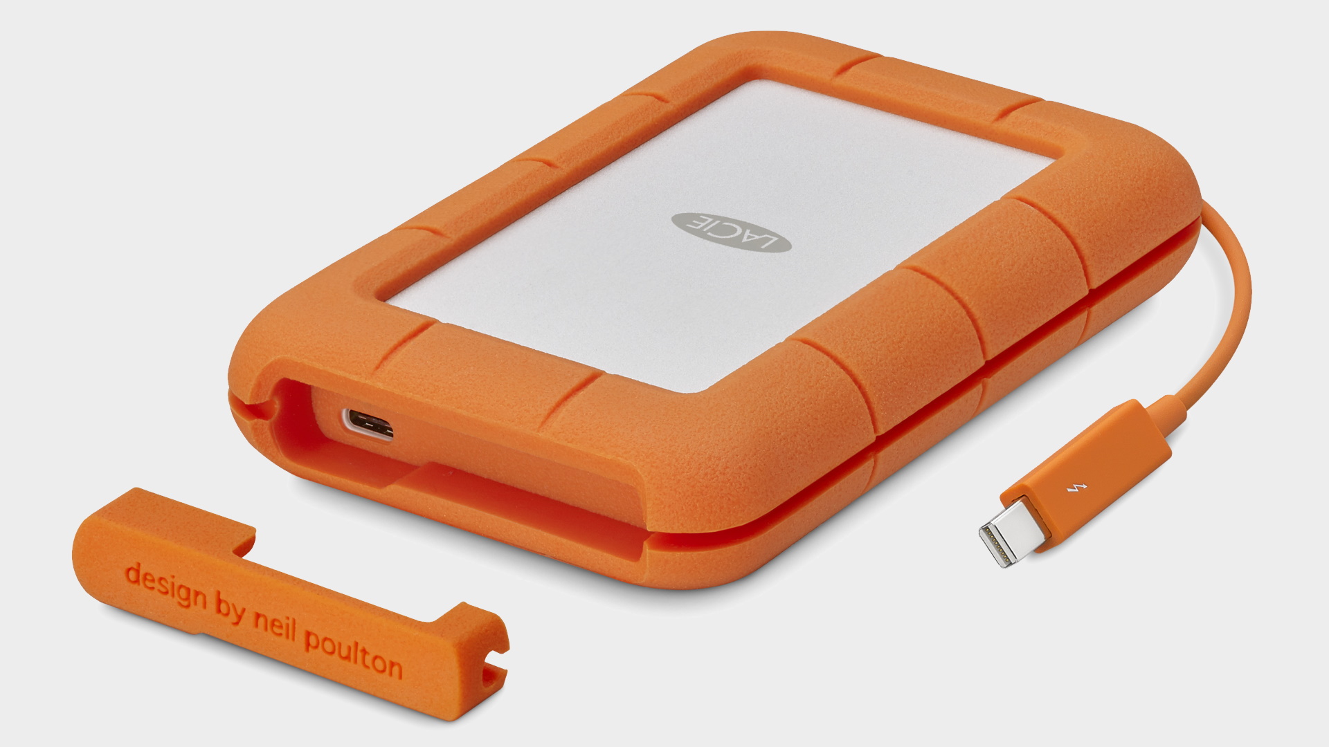 LaCie Rugged Thunderbolt external hard drive on a grey background with cable.