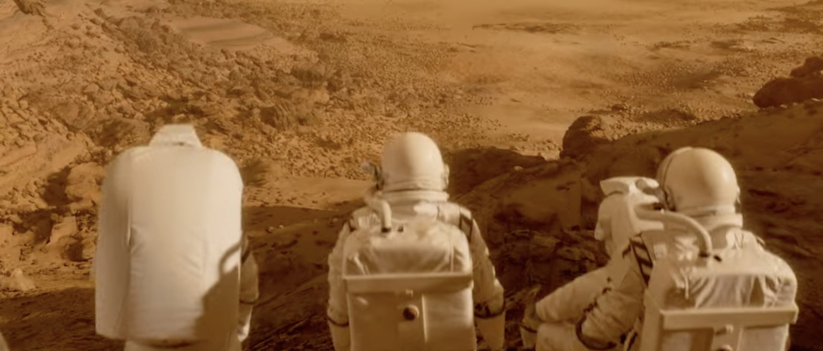 Three astronauts look out at the Mars terrain in the For All Mankind season 3 trailer
