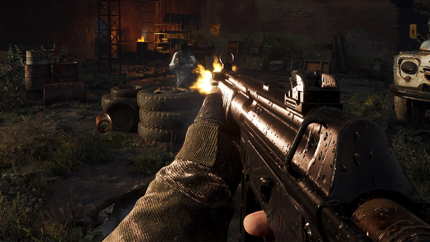 Stalker 2 - A battered SMG is fired at an enemy behind some tires