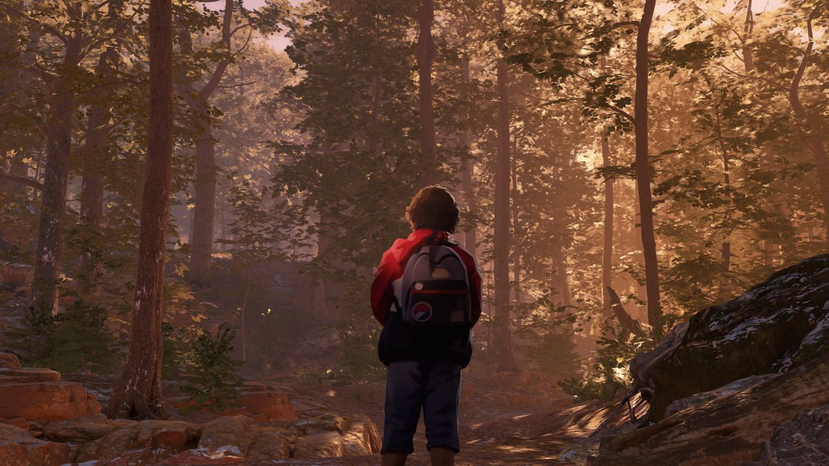 a character wearing a backpack and a red jacket stands in the woods during golden hour in As Dusk Falls