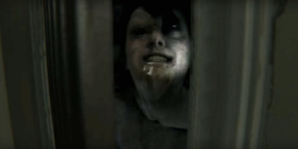 The ghost in P.T. looking through the crack of the bathroom door.