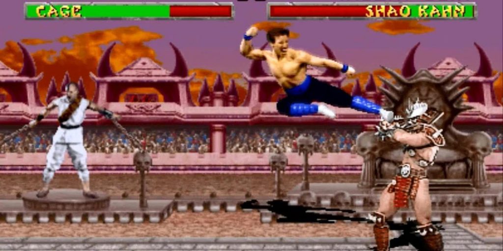 Johnny Cage performs an aerial kick on Shao Khan as Kano and fans watch from a distance.