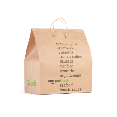 A brown paper bag with handles and the "Amazon Fresh" logo on it.