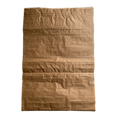 A wrinkled piece of brown paper insulation.