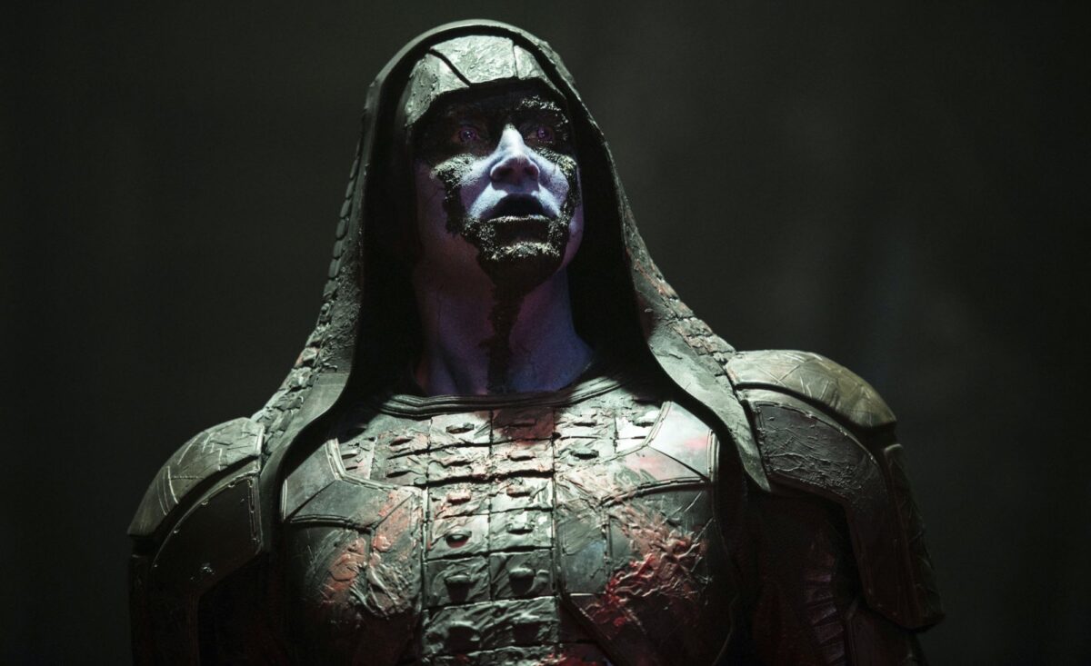 A blue alien being, male presenting, in ornate robes and a hood: Ronan (Lee Pace) in "Guardians of the Galaxy."