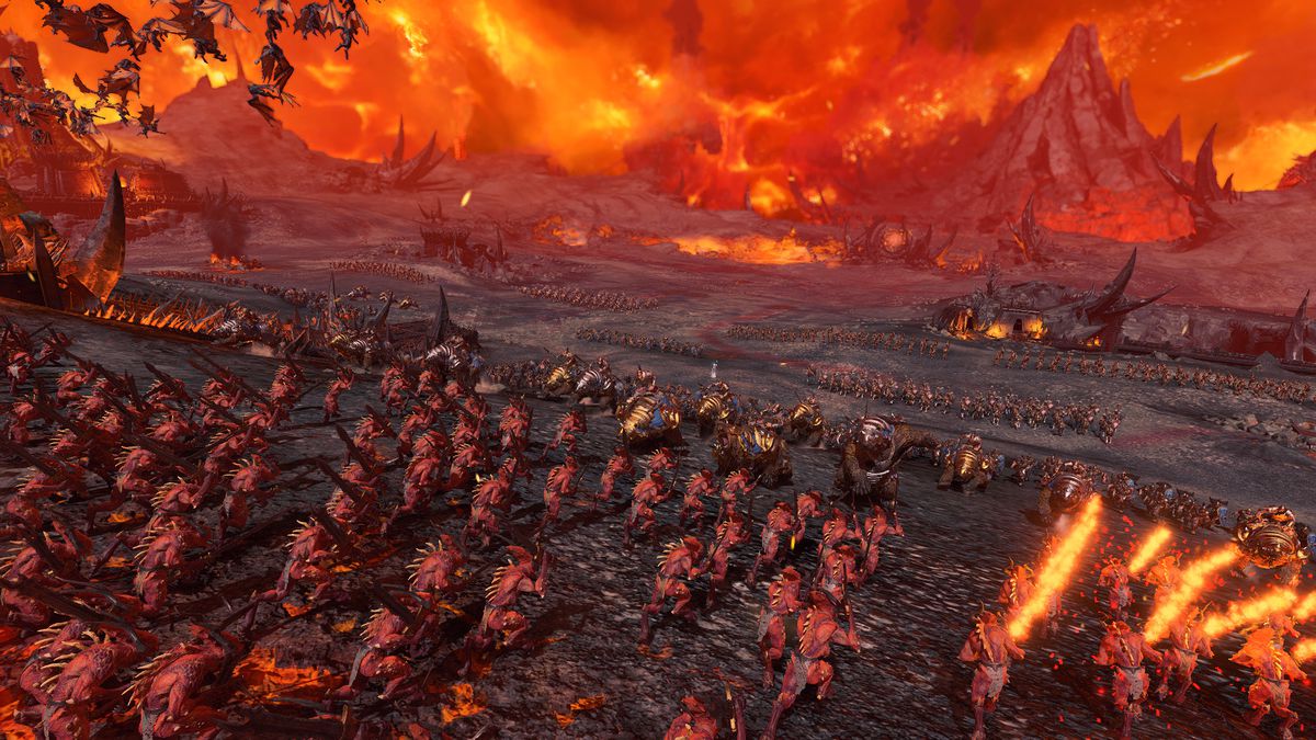 A view from behind a horde of demons as they race toward the Tzarina’s lines in Total War: Warhammer 3