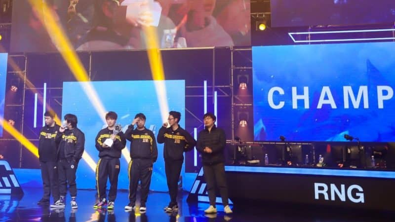 Royal Never Give Up on stage after winning a Dota 2 tournament