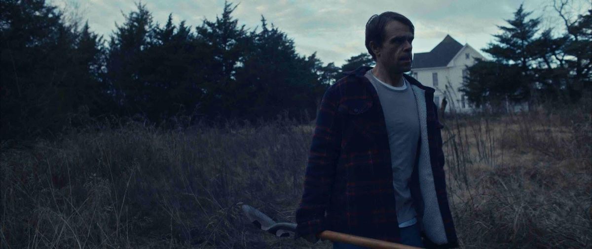 Nick Stahl in What Josiah Saw, carrying a shovel