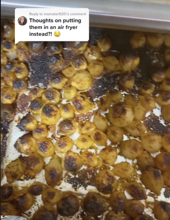 cooked onions on an air fryer sheet