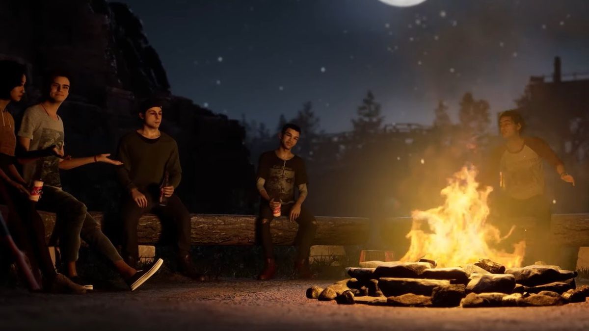 The camp counselors of Hackett’s Quarry hang out around a campfire