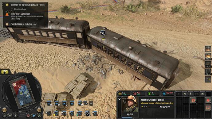 CoH 3 review - troops garrison inside an old train carriage in the desert