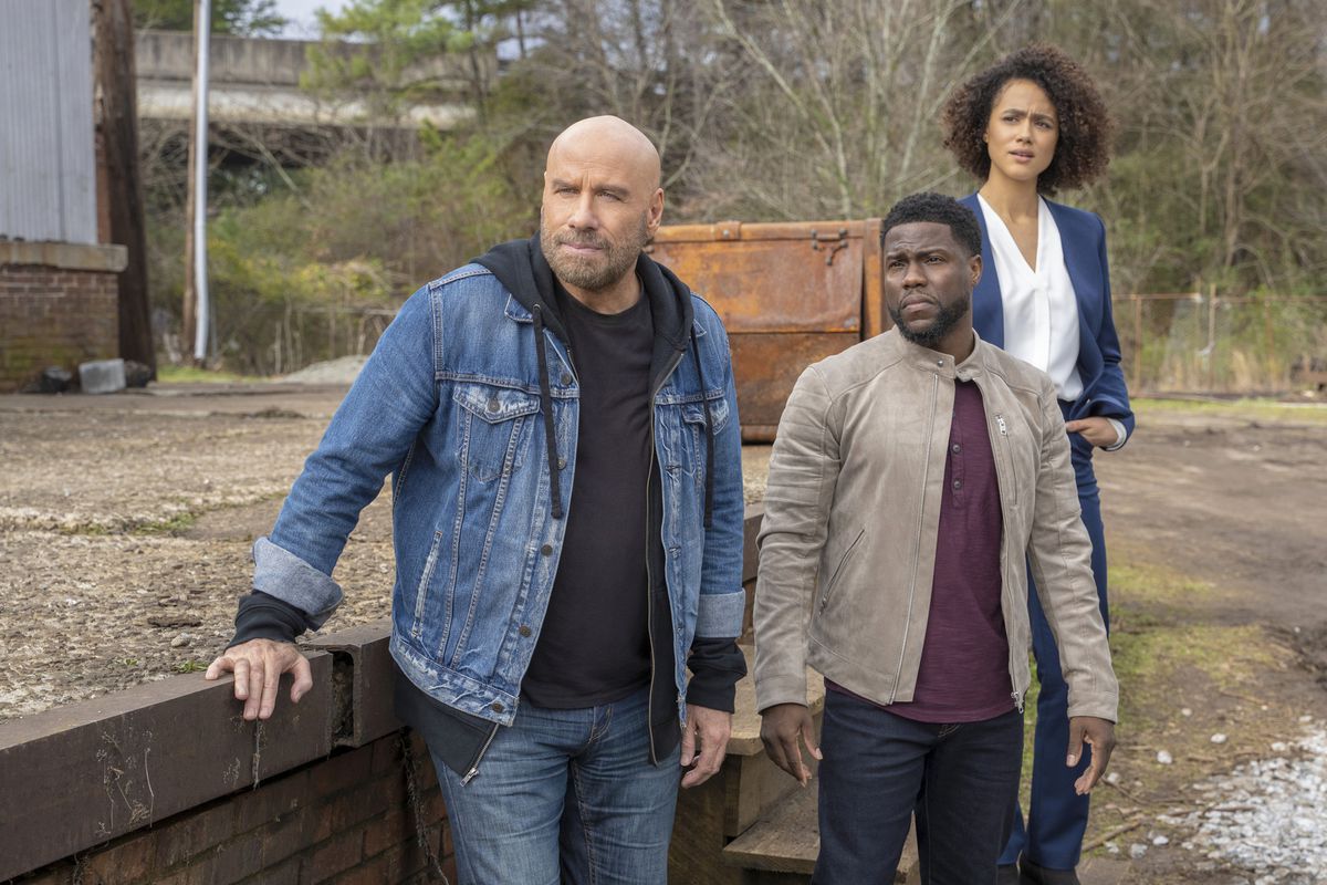(L-R) John Travolta, Kevin Hart and Nathalie Emmanuel in a scene from Die Hart: The Movie.
