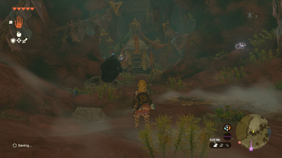 Link stares at a temple with a chest containing the rubber armor head piece in Zelda Tears of the Kingdom.