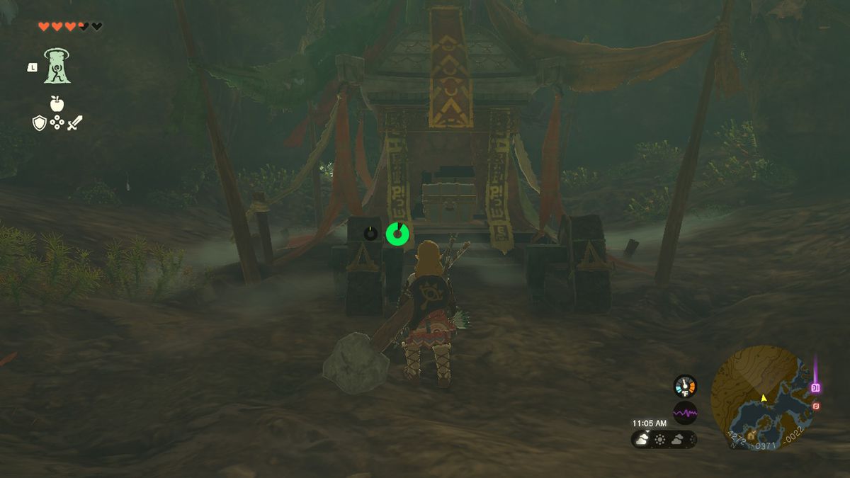 Link approaches a chest in a cave containing the final piece of the rubber armor in Zelda Tears of the Kingdom.