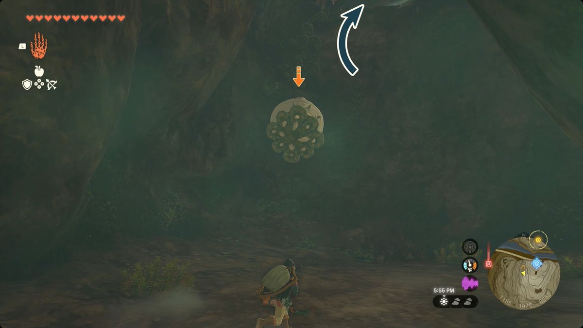 The Legend of Zelda: Tears of the Kingdom Link fighting a Like Like in Dueling Peaks South Cave with an arrow pointing up to a higher room