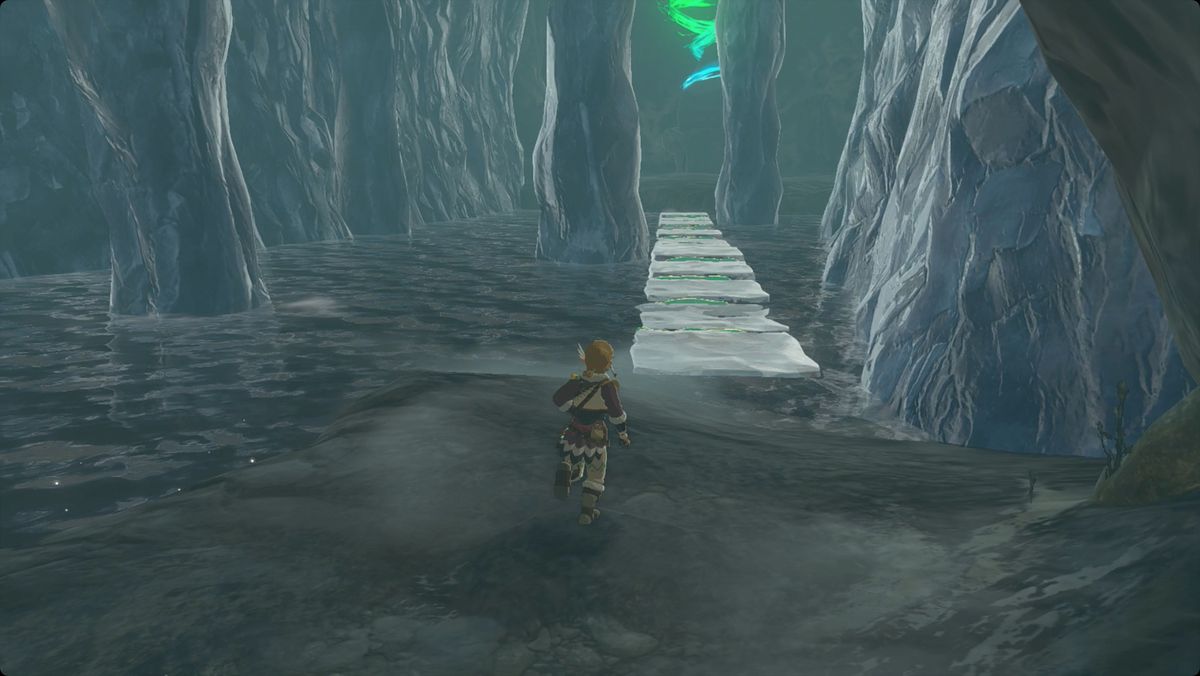The Legend of Zelda: Tears of the Kingdom Link crossing a bridge made of ice in Kopeeki Drifts Cave to reach Nouda Shrine