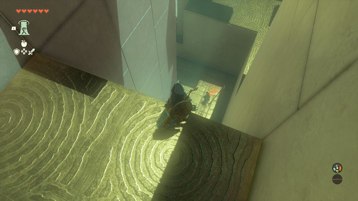 Link stands on a ledge above enemies in the Orochium Shrine in Zelda Tears of the Kingdom.