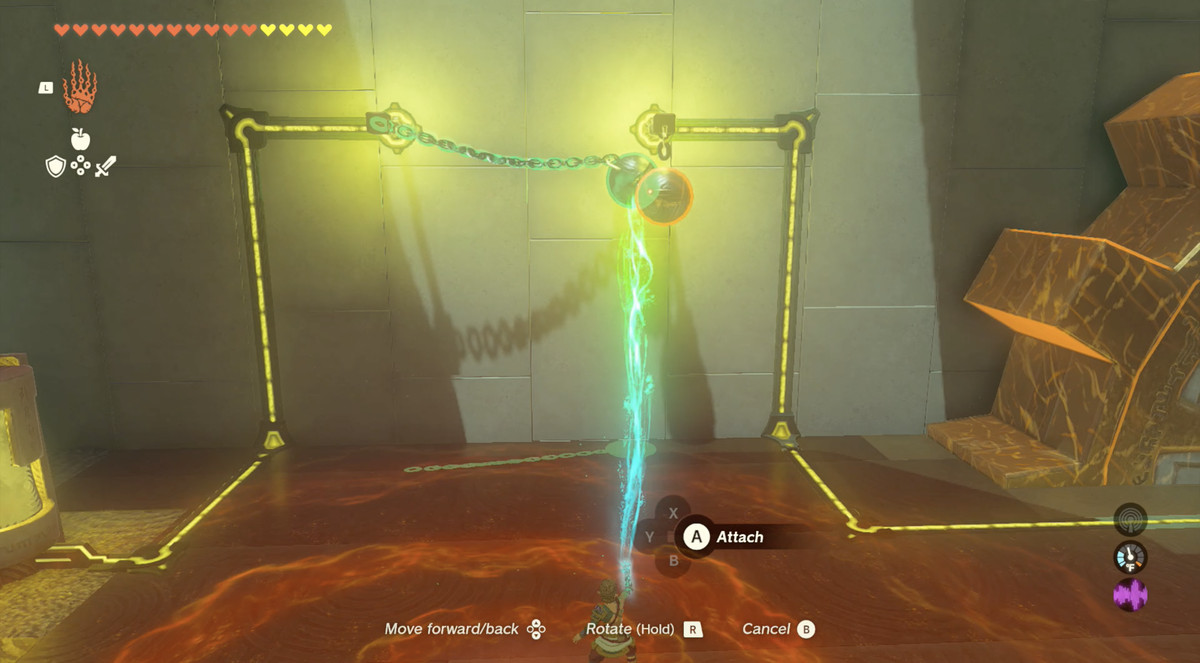 An image shows a puzzle in The Legend of Zelda: Tears of the Kingdom. Link is using Ultrahand to glue an electrified hanging ball to another ball.