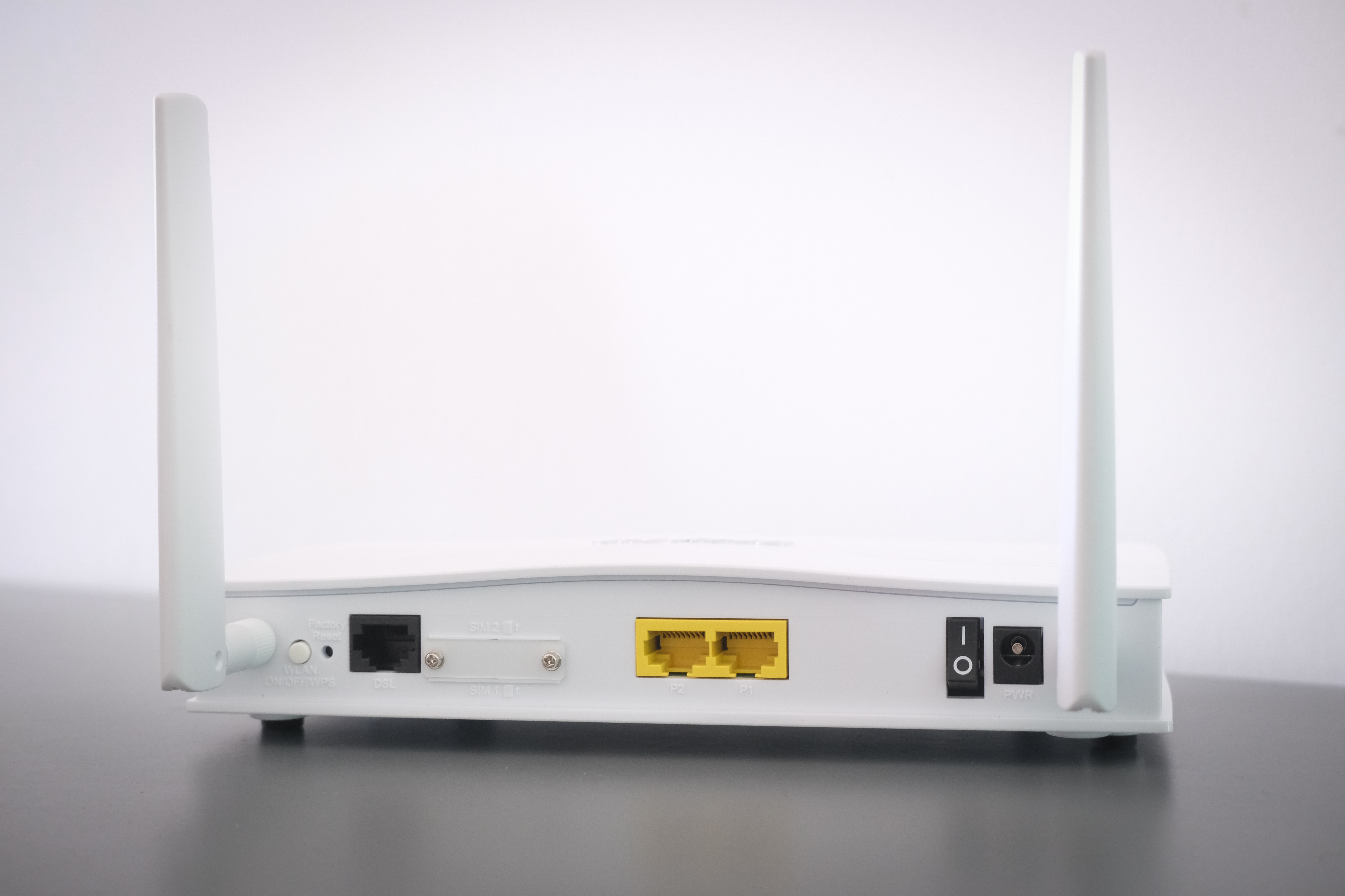 Rear view of a white-colored router