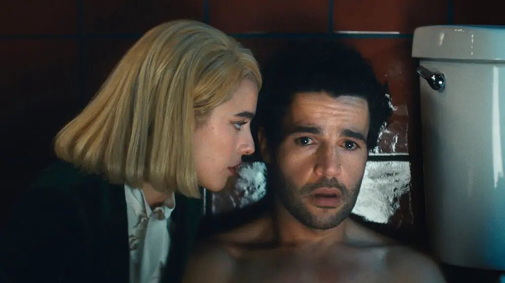 (L-R) Margaret Qualley and Christopher Abbott in Sanctuary.