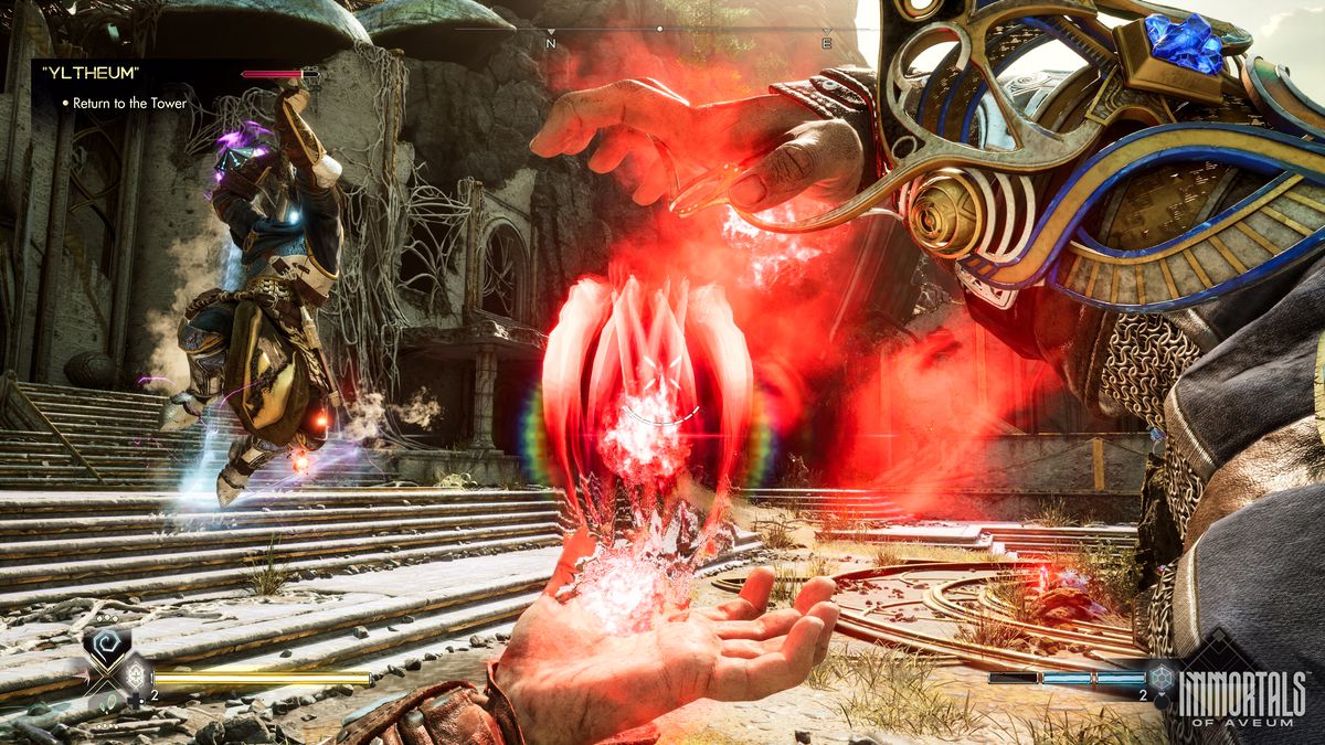 An Immortals of Aveum screenshot shows the player in first-person generating red magic between their hands