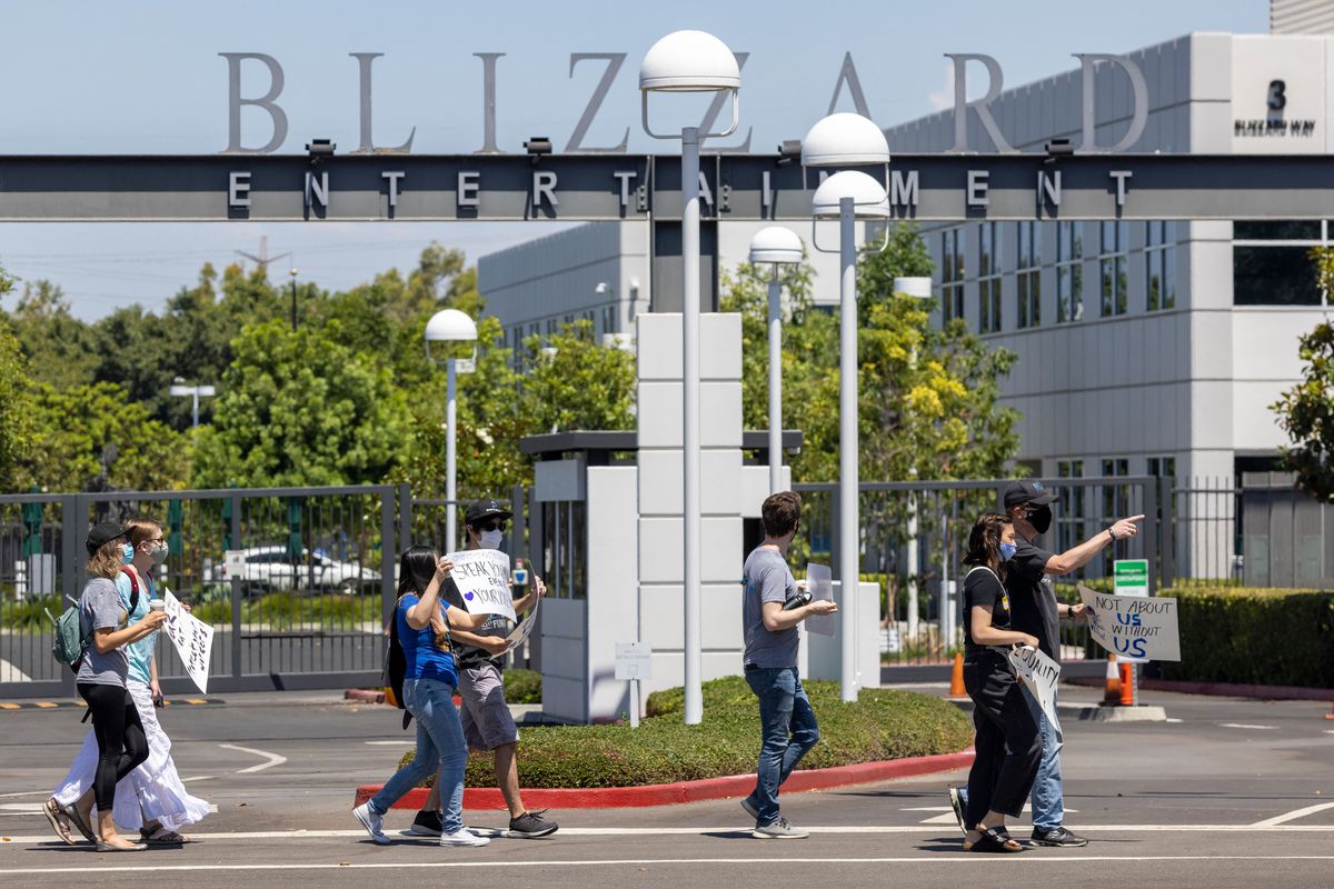 Activision Blizzard workers protesting the company’s response to the California Civil Rights Department’s discrimination lawsuit. People are holding signs in front of the Blizzard Entertainment entrance in Irvine, California.