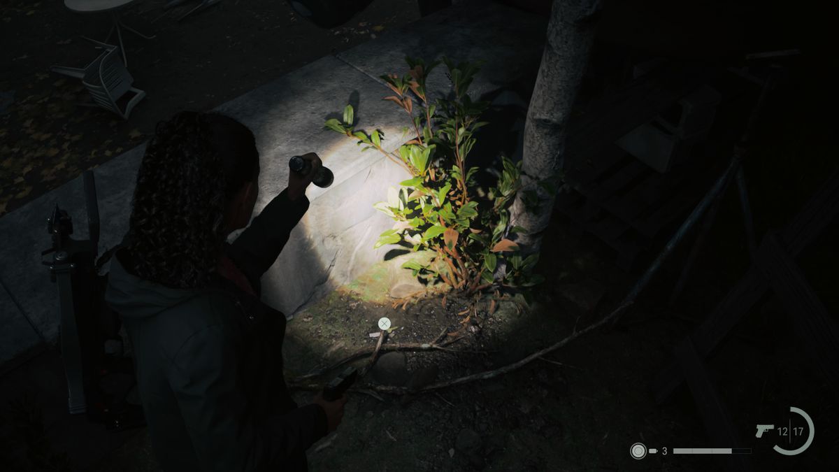 A key sitting on the ground in Watery in Alan Wake 2