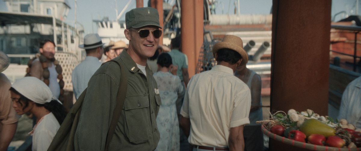 Wyatt Russell, wearing a military uniform, smiles in Monarch: Legacy of Monsters.