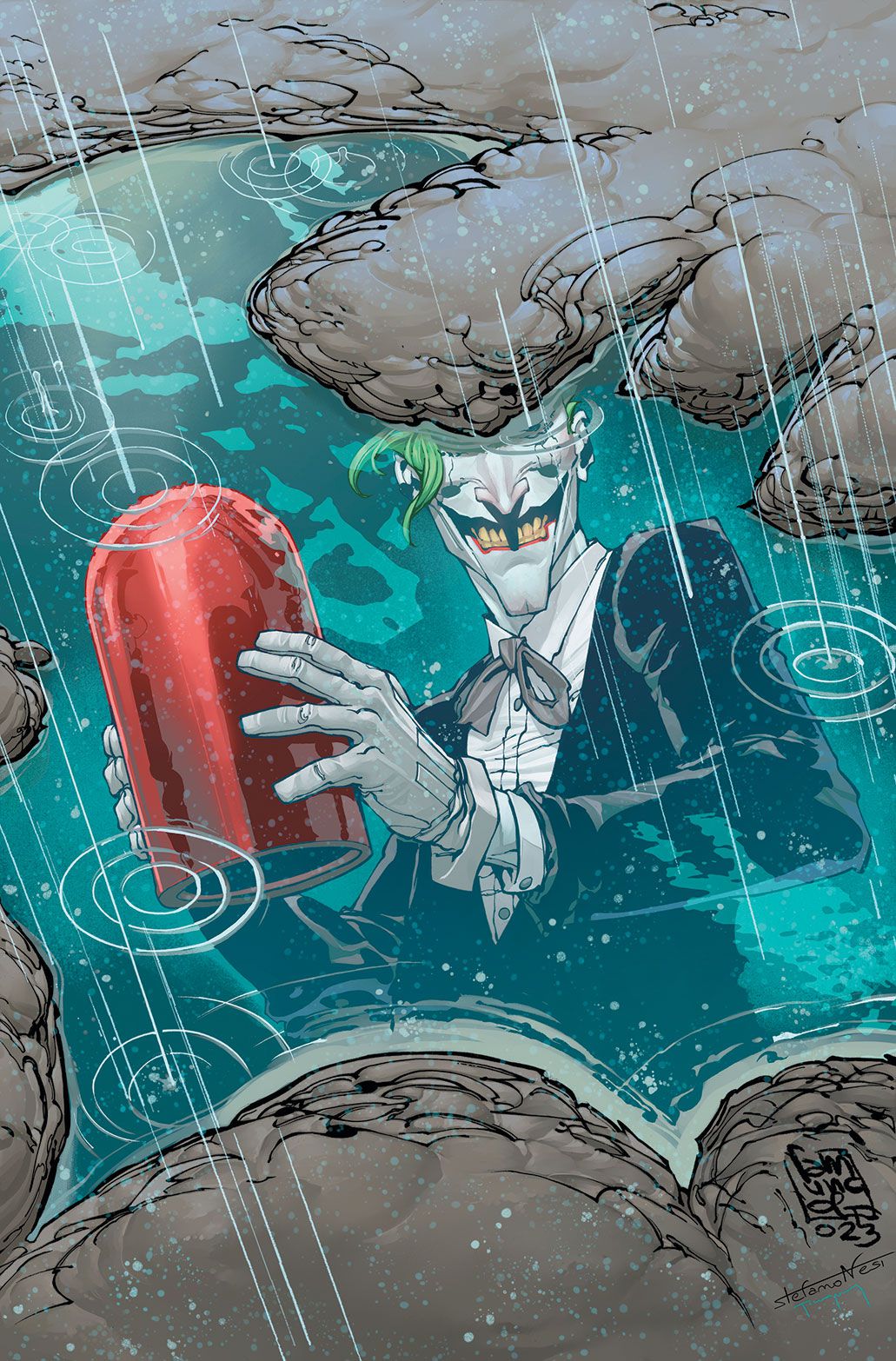 The Joker’s image is reflected in a bat-shaped puddle. His eyes are not visible, but he’s grinning and holding his Red Hood mask.