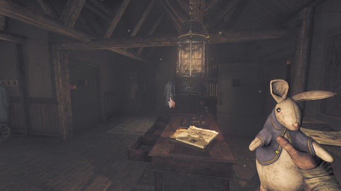 Amnesia: The Bunker review screenshot shows Henri in the "safe" administration room, looking at the lit lantern and clutching a toy rabbit.