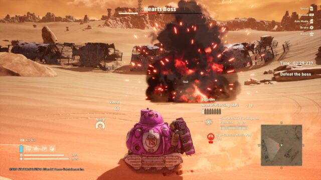 Screenshot of the game Sand Land showing a tank creating a huge explosion in front of it. The words "Hearts Boss" and a hit-point bar can be seen along the top indicating that the characters are fighting the Hearts clan boss.