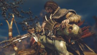 Talion stabbing an orc while covering it's mouth