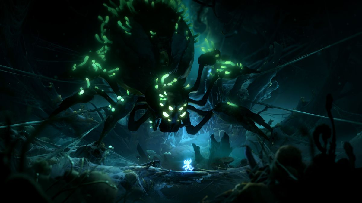 A giant spider stands atop the main character in Ori and the Will of the Wisps